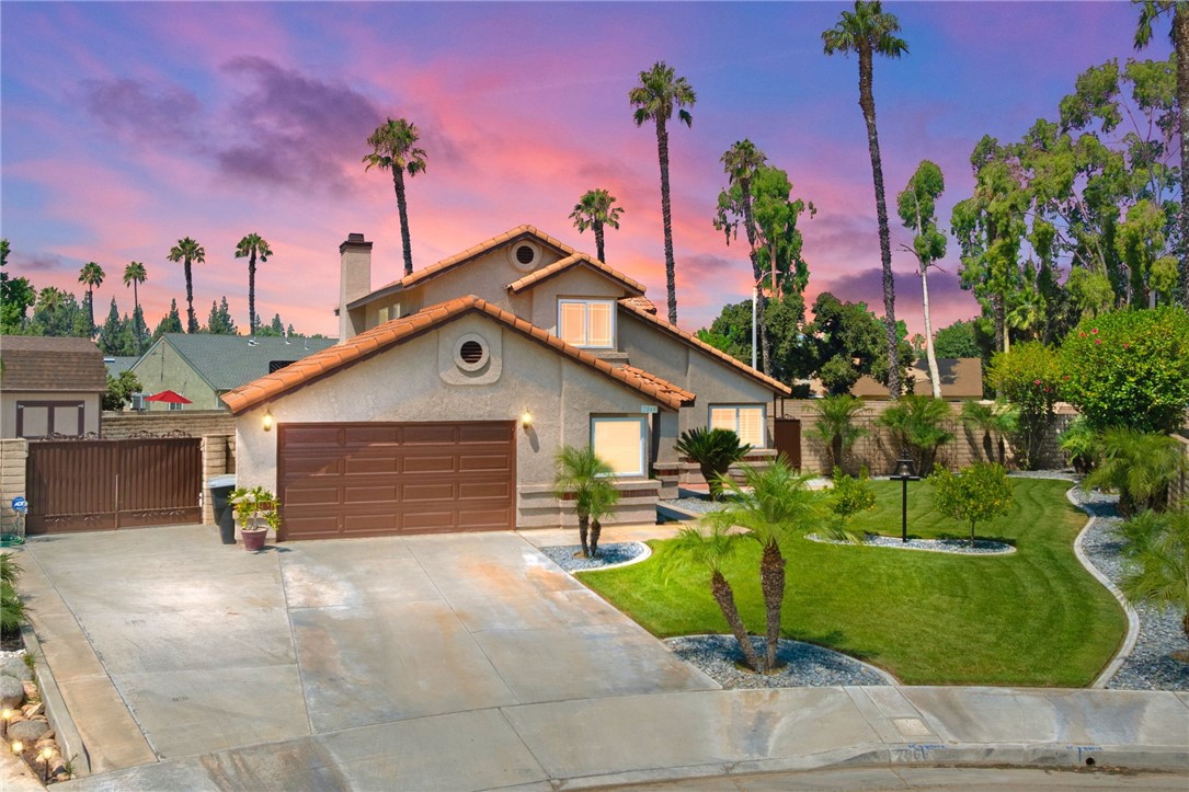 2866 Marisa Court Riverside, CA 92503 - Photo 1 of 1 a front view of a house with a garden and plants
