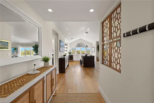 a open kitchen with sink and cabinets