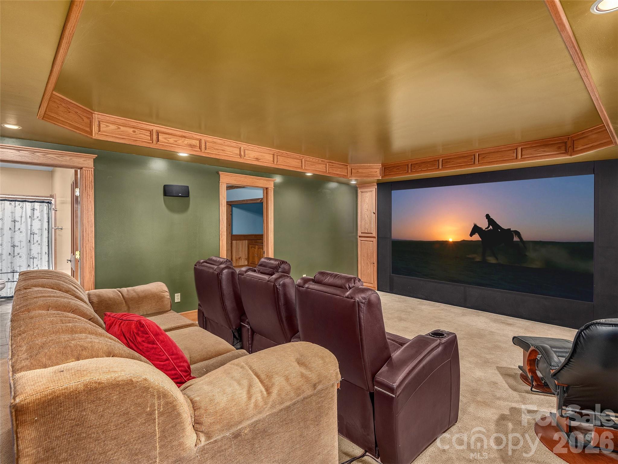 40 Deer Ridge Road Mills River, NC 28759 - Photo 18 of 35 a living room with furniture and a flat screen tv