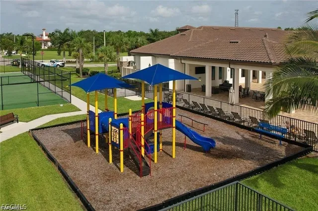 an outdoor space with furniture