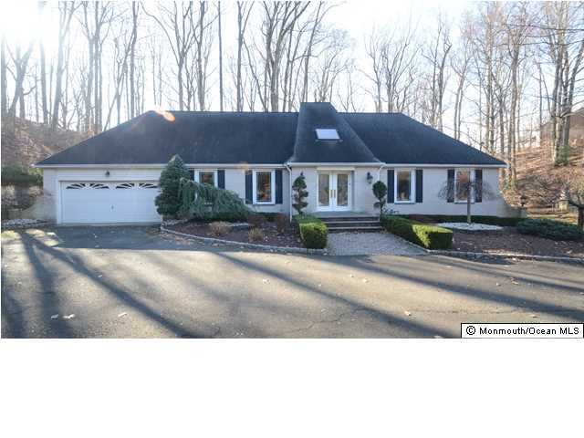 14 Highpoint Road Holmdel, NJ 07733 - Photo 1 of 17 a view of a house with a yard