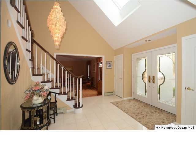 14 Highpoint Road Holmdel, NJ 07733 - Photo 2 of 17 a black and white photo of a livingroom