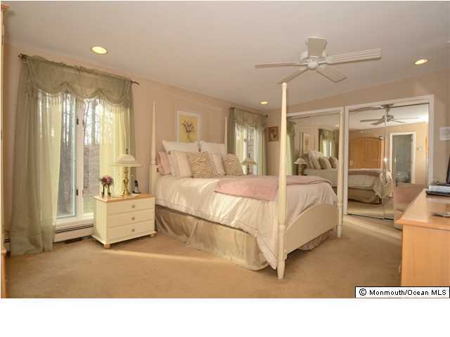14 Highpoint Road Holmdel, NJ 07733 - Photo 10 of 17 a living room with furniture and white walls