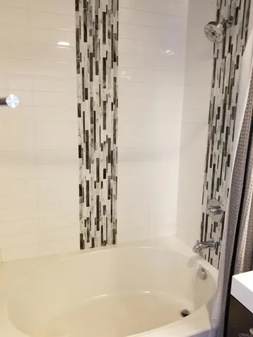 a bathroom with bathtub