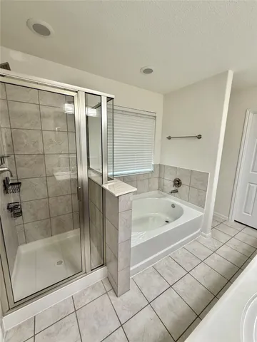 a white toilet sitting next to a sink