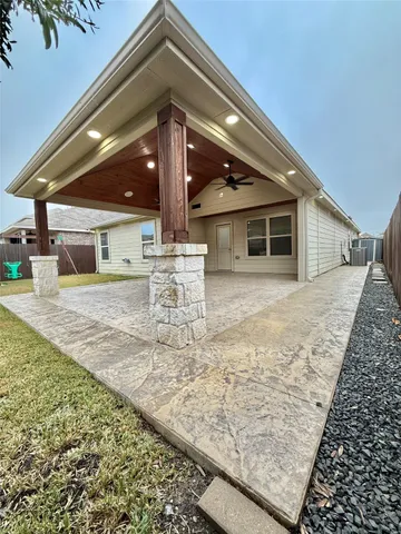 a house view with a backyard space