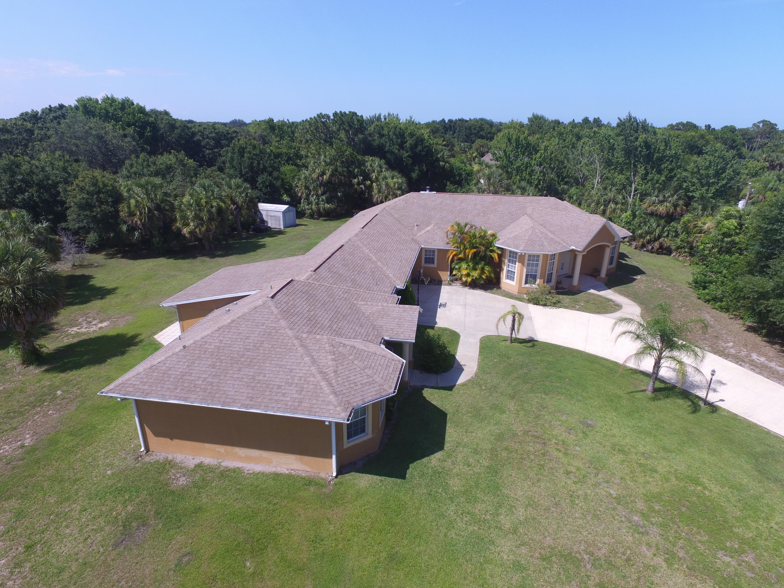 3661 Turtle Mound Road Melbourne, FL 32934 - Photo 3 of 56 side