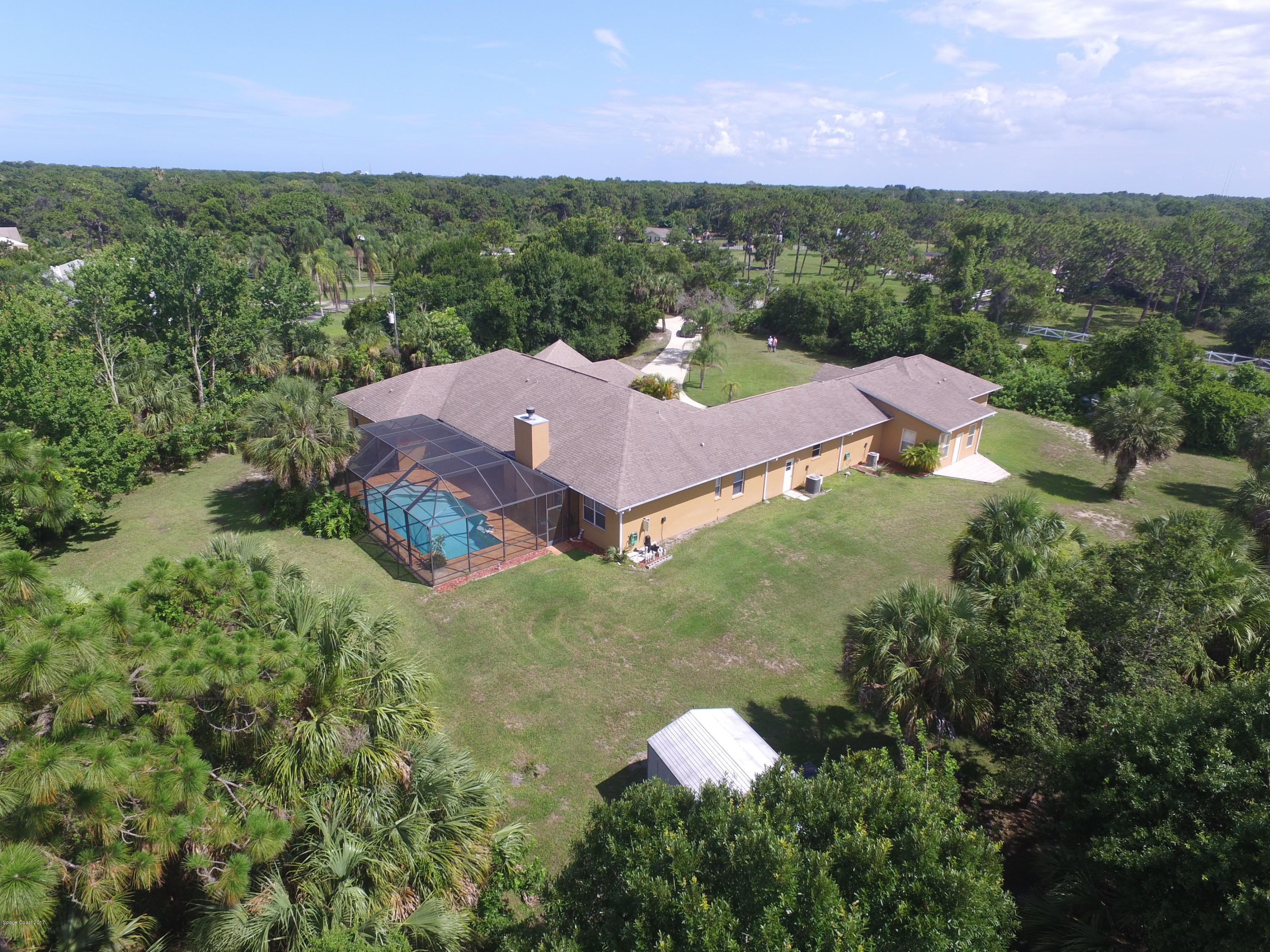 3661 Turtle Mound Road Melbourne, FL 32934 - Photo 4 of 56 rear