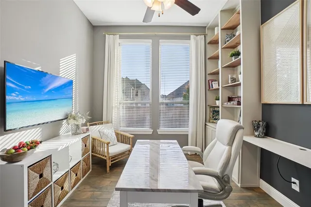 a living room with furniture and a window