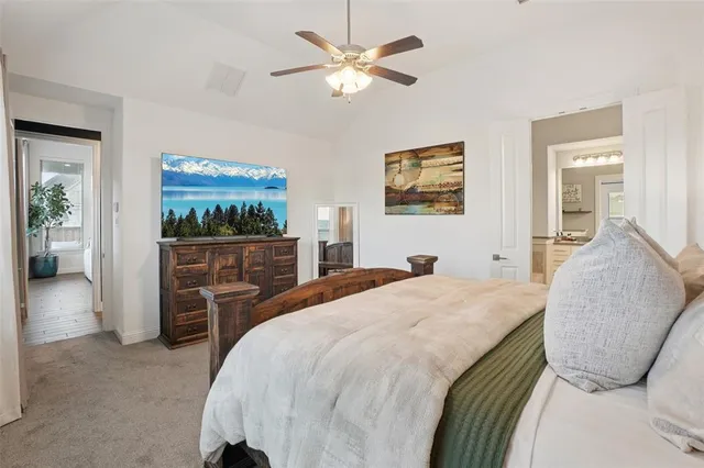 a bathroom with a granite countertop sink double and mirror