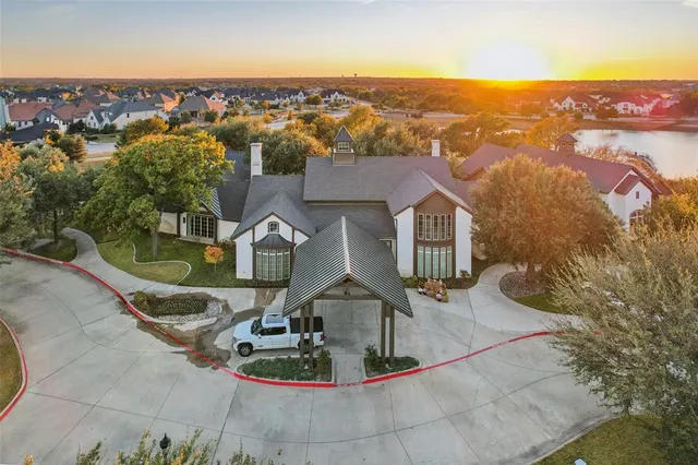 an aerial view of a house with outdoor space