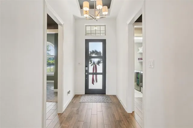 wooden floor in a gallery with windows