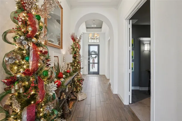 a view of entryway with wooden floor