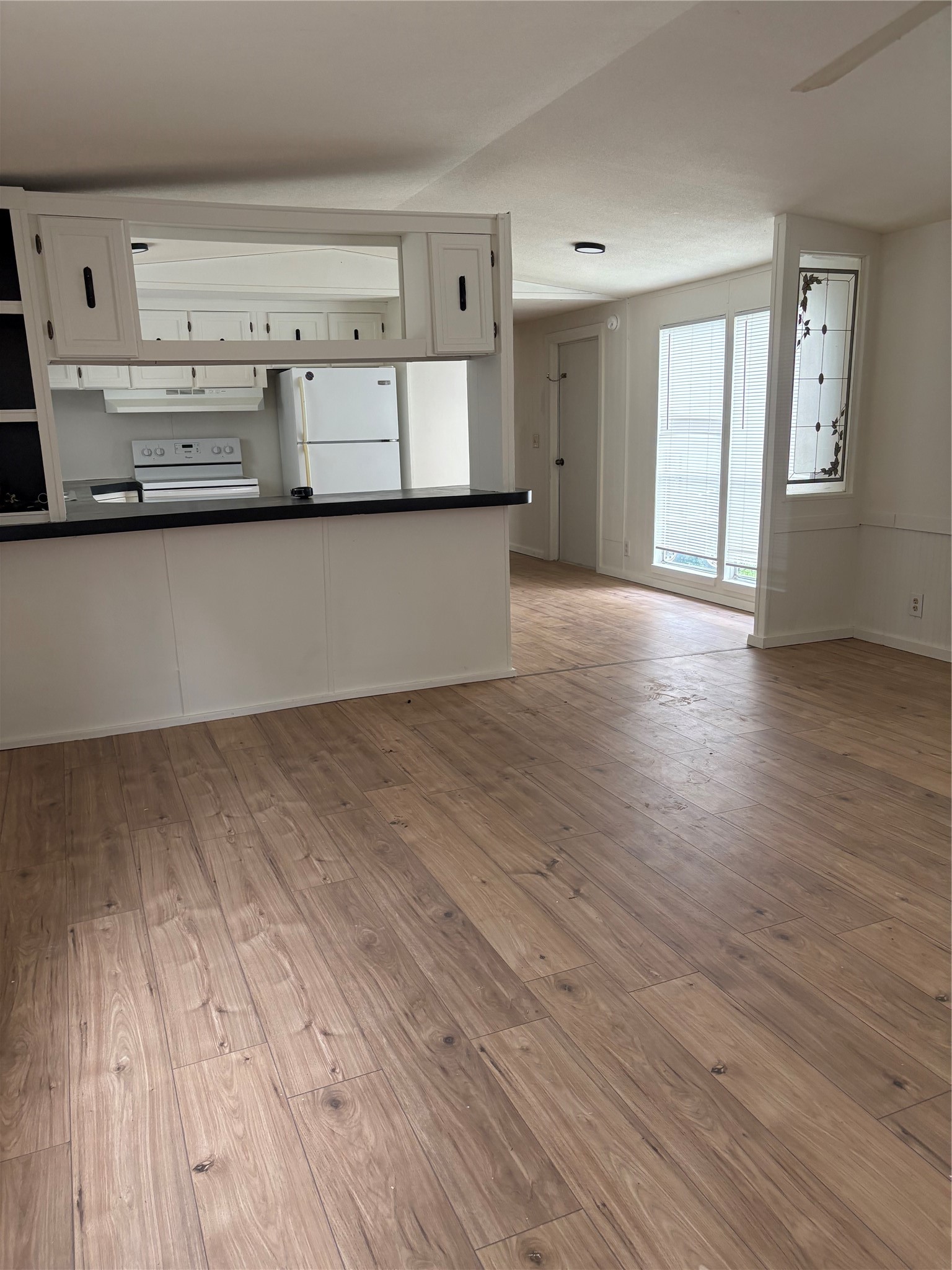 144 Lees Village Road Livingston, TX 77351 - Photo 2 of 16 Livingroom view toward kitchen