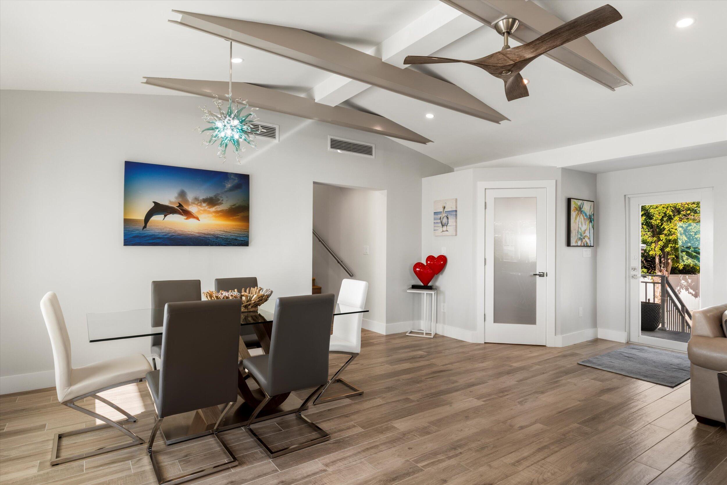 680 Elma Avenue Big Pine Key, FL 33043 - Photo 16 of 89 a view of a livingroom with furniture a ceiling fan and wooden floor