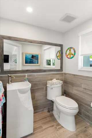 an aerial view of a golf course with chairs