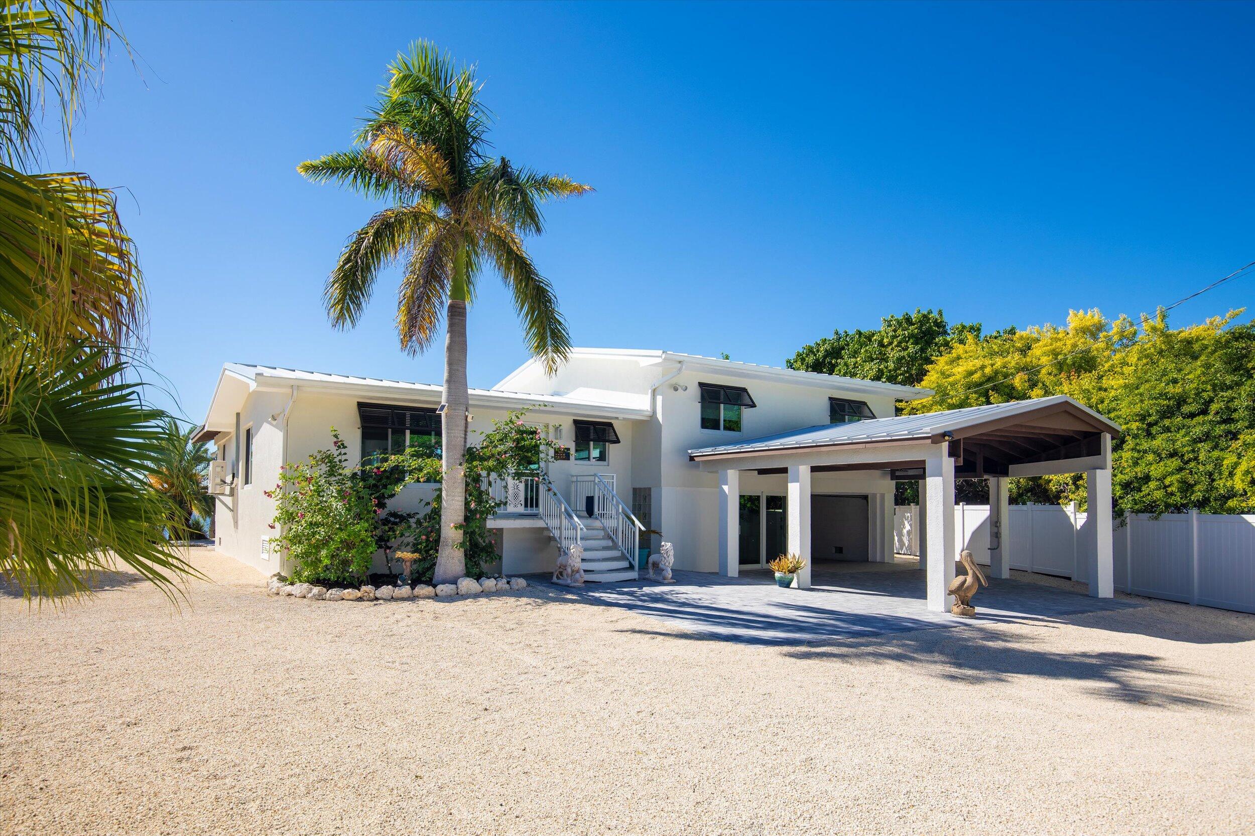 680 Elma Avenue Big Pine Key, FL 33043 - Photo 56 of 89 front view of a house with a porch