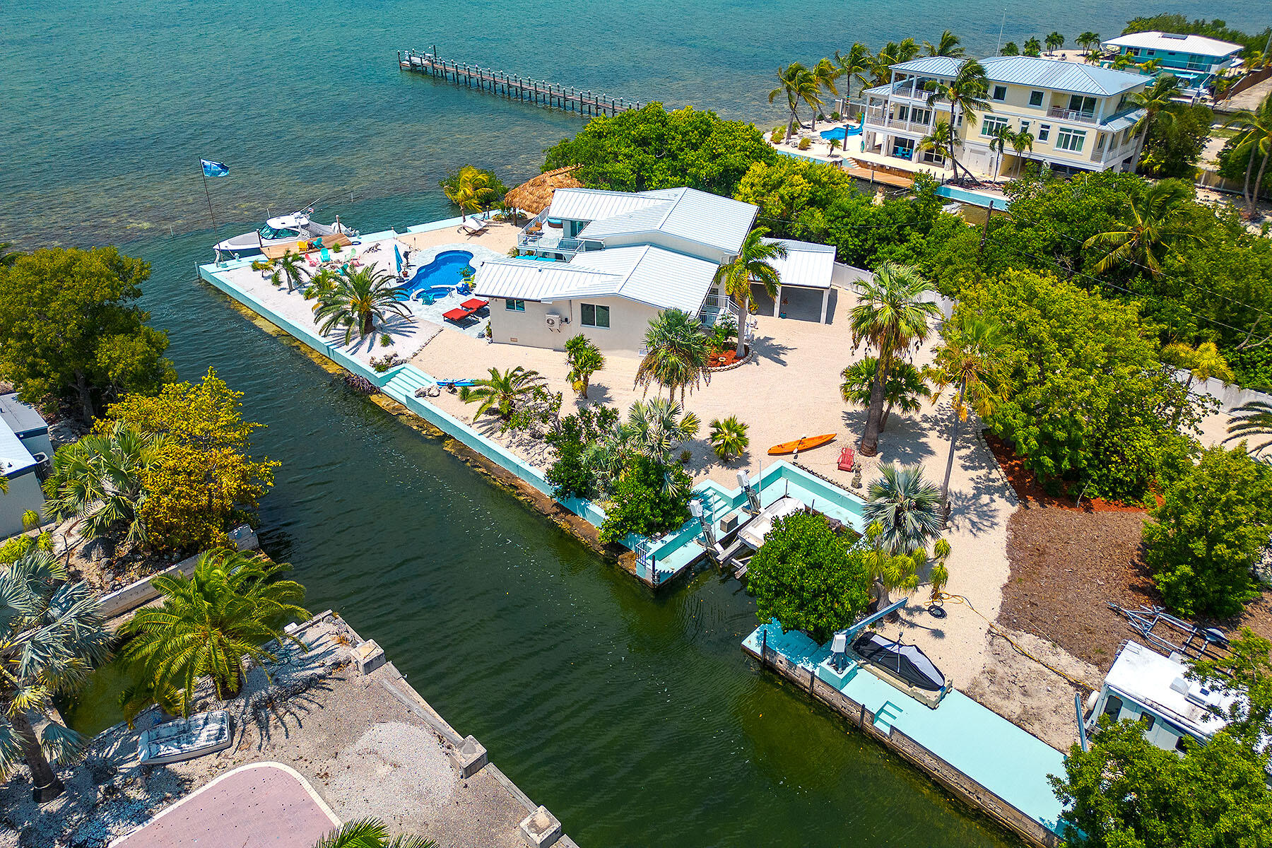 680 Elma Avenue Big Pine Key, FL 33043 - Photo 88 of 89 an aerial view of a house a yard swimming pool and outdoor seating