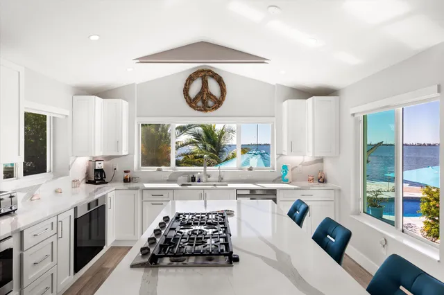 a view of swimming pool with sitting area