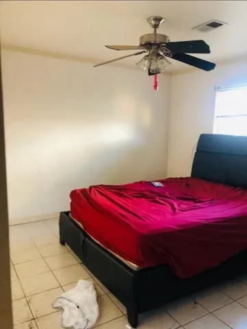 a room with furniture and a window