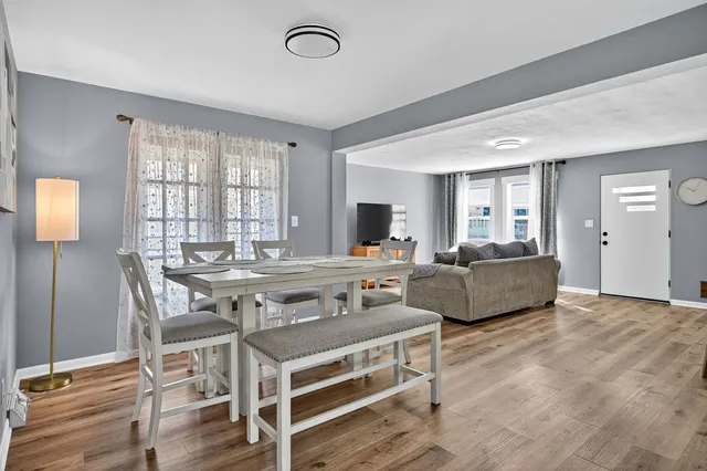 a view of a livingroom with furniture and window