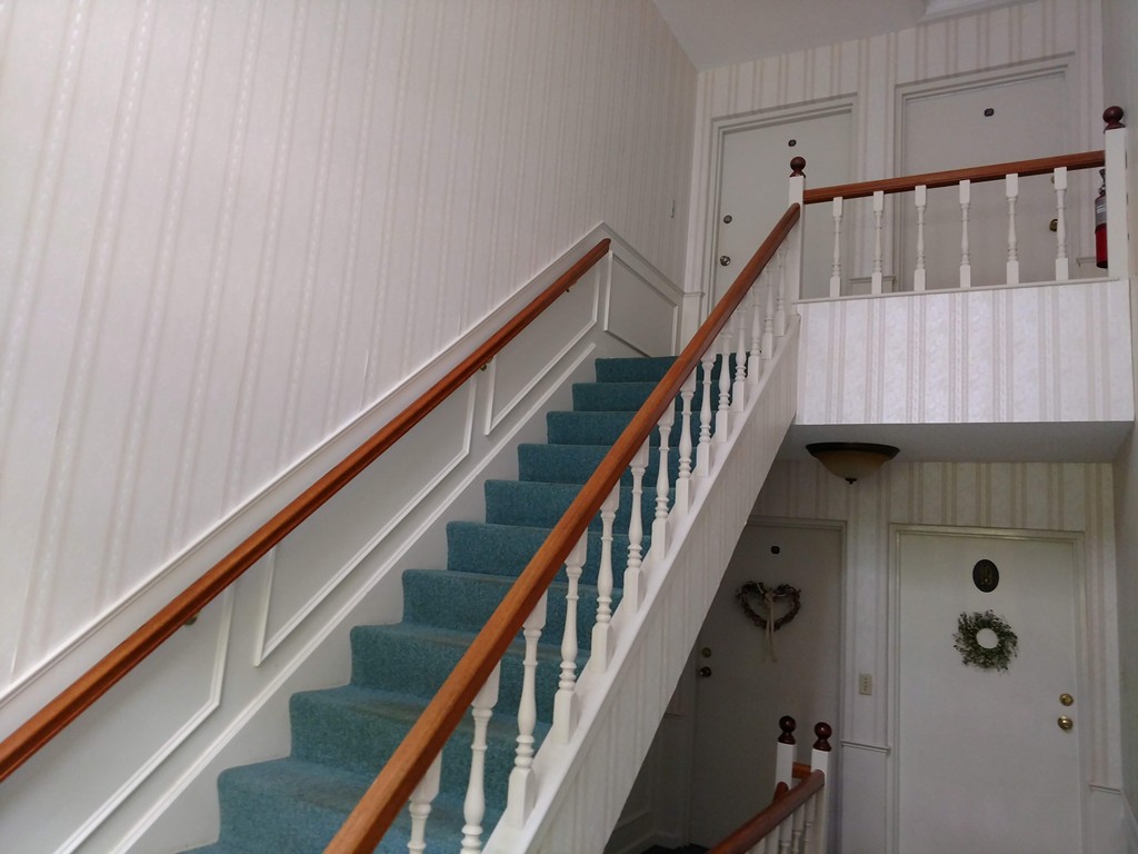 683 Old Post Road, Unit 18 Dennis, MA 02638 - Photo 19 of 25 a view of entryway with wooden floor