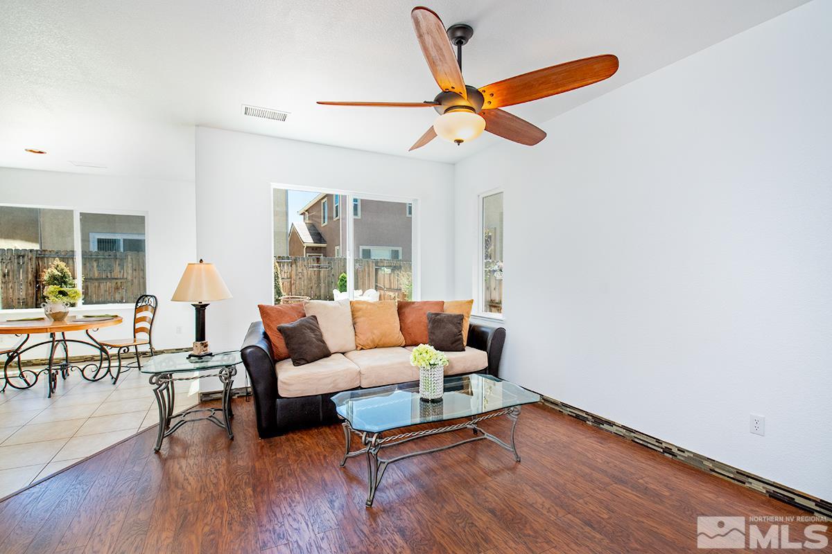 2050 Bears Ranch Drive Reno, NV 89521 - Photo 7 of 21 a living room with furniture and a ceiling fan