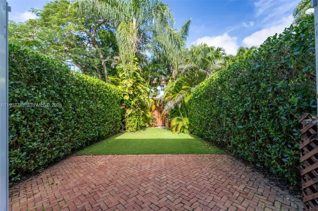 a view of backyard with green space