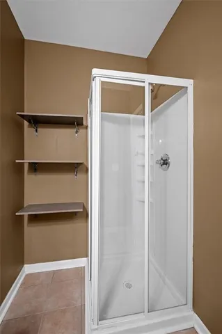 a view of a balcony with wooden floor