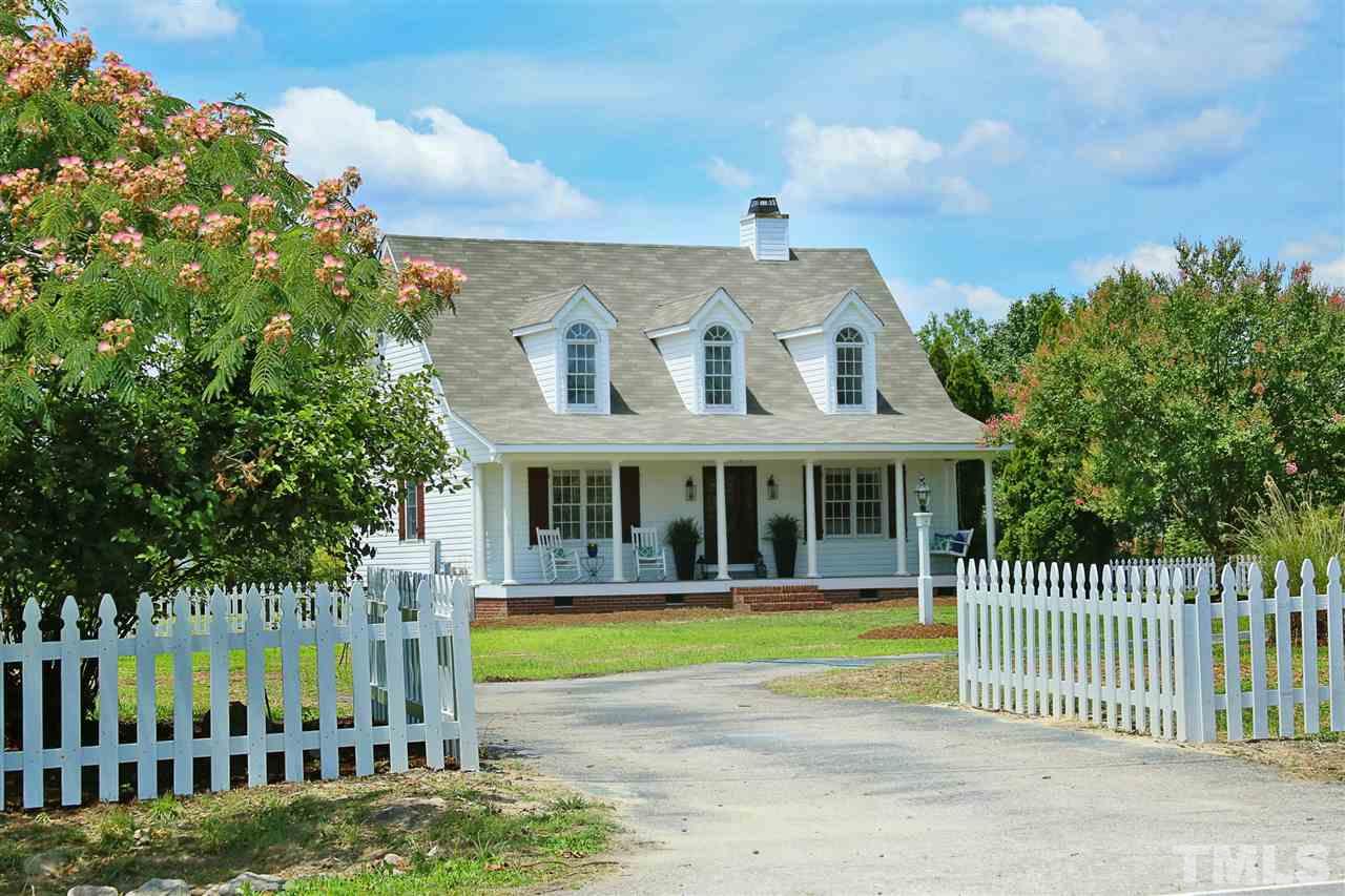2001 Edgemont Road Wendell, NC 27591 - Photo 1 of 30 a front view of a house with a garden and plants