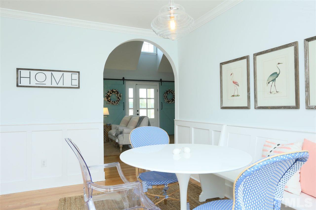 2001 Edgemont Road Wendell, NC 27591 - Photo 14 of 30 a view of a dining room with furniture and wooden floor