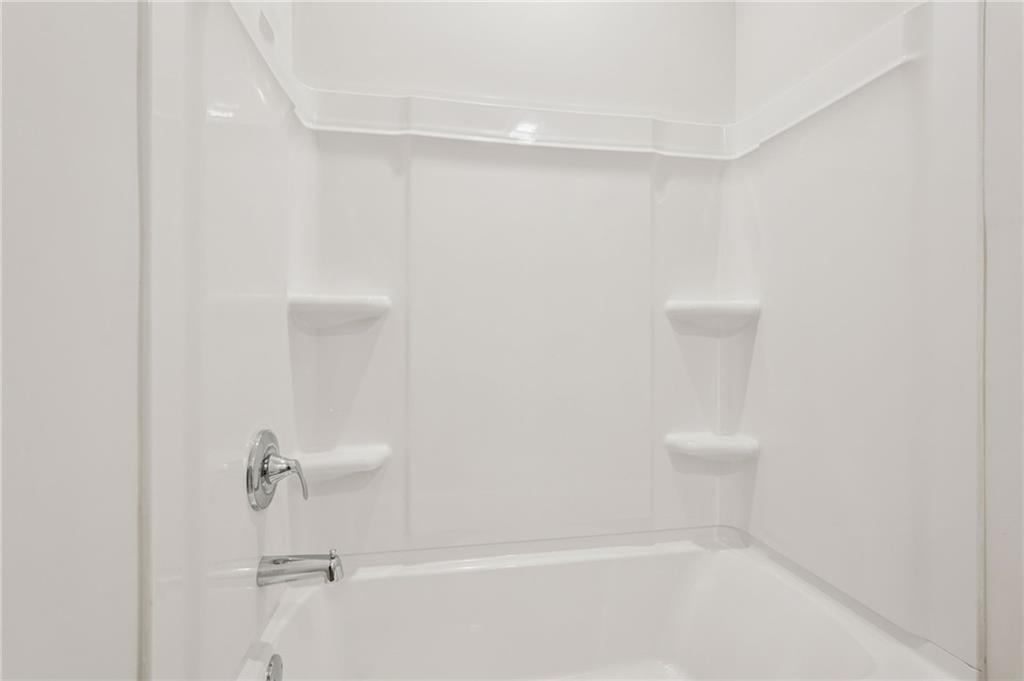 7204 Ensemble Court Fairburn, GA 30213 - Photo 26 of 56 a close up of a shower