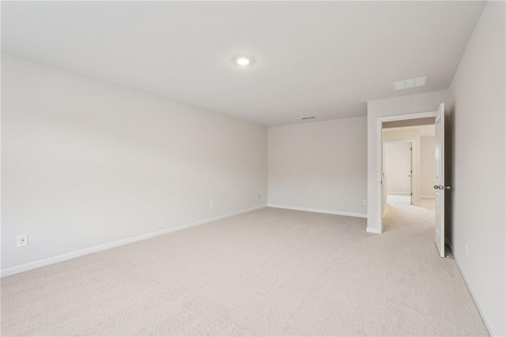 7204 Ensemble Court Fairburn, GA 30213 - Photo 31 of 56 a view of an empty room