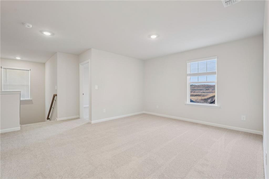 7204 Ensemble Court Fairburn, GA 30213 - Photo 40 of 56 a view of an empty room with a window