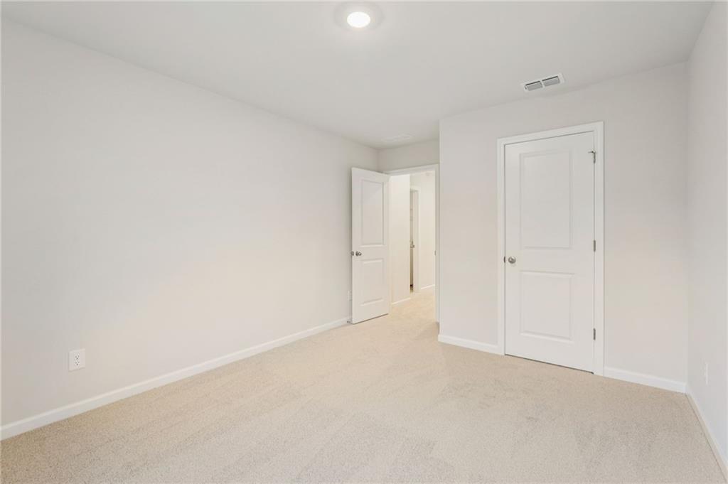 7204 Ensemble Court Fairburn, GA 30213 - Photo 52 of 56 a view of an empty room