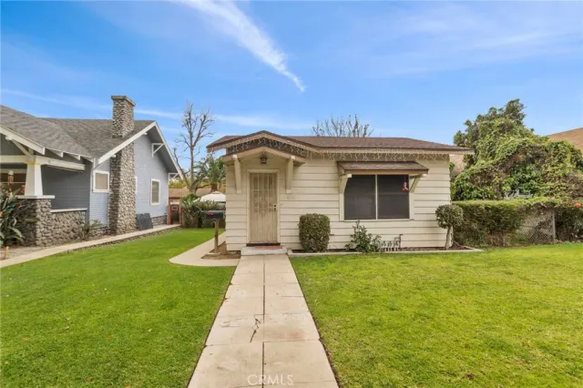 a front view of house with yard