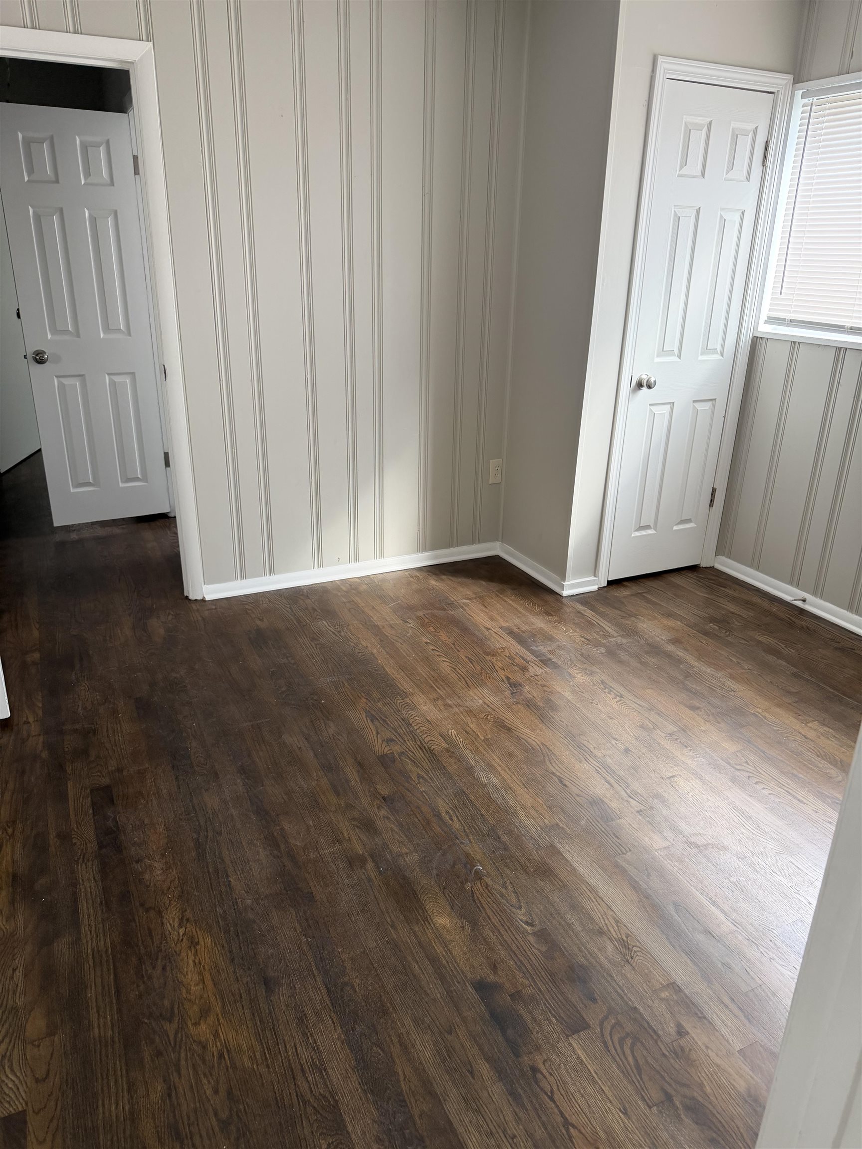 194 East Biscayne Road Memphis, TN 38109 - Photo 5 of 6 a view of a livingroom with wooden floor and a window