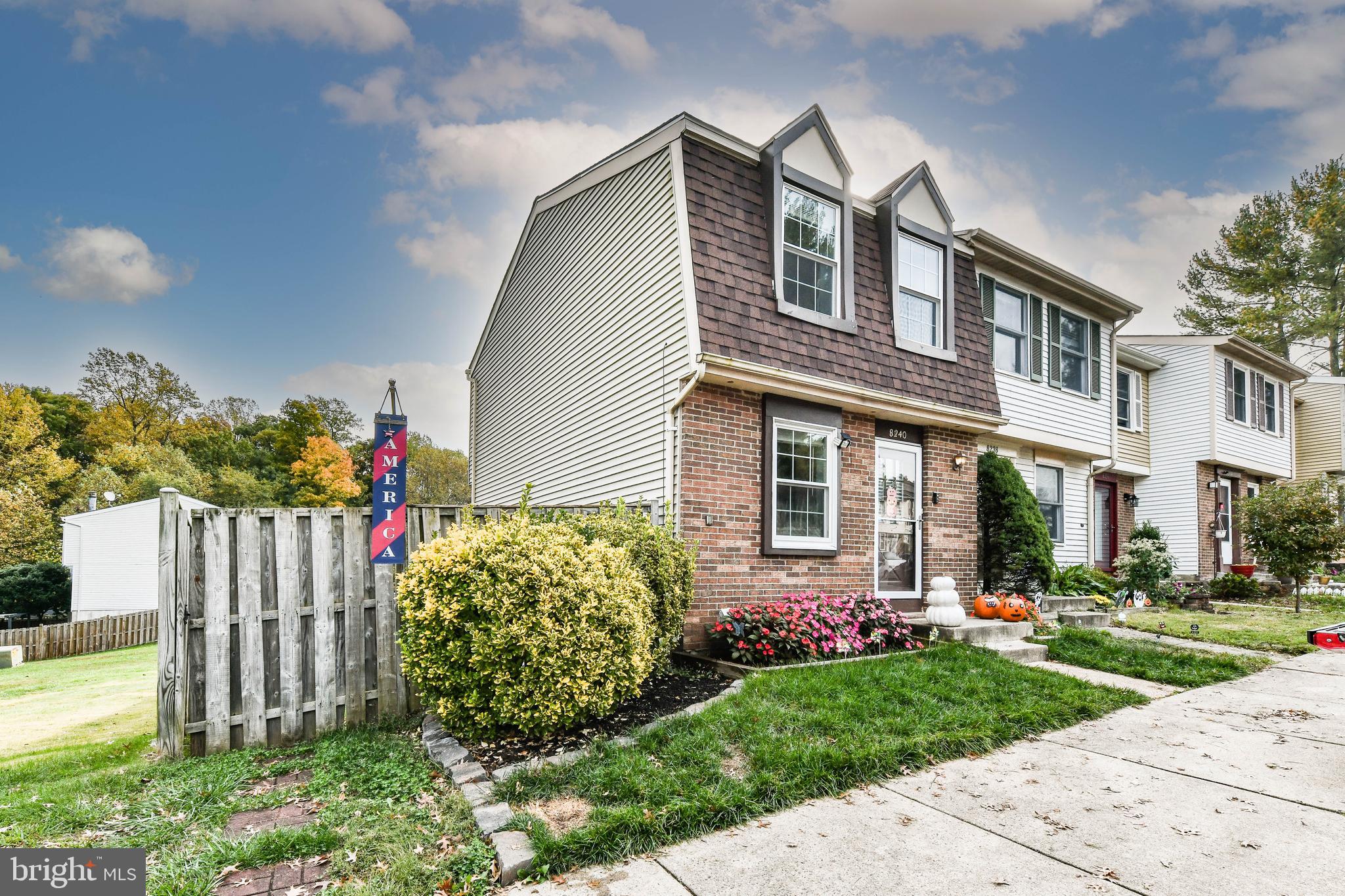 Incredible end unit with huge back yard!