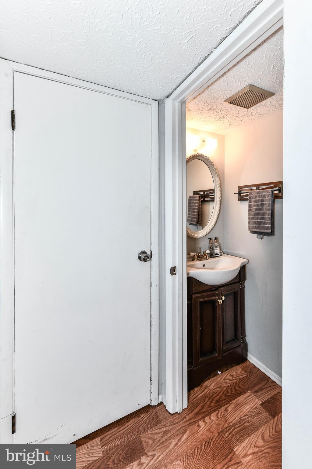 8240 Crestmont Circle Springfield, VA 22153 - Photo 19 of 24 Half bath in basement