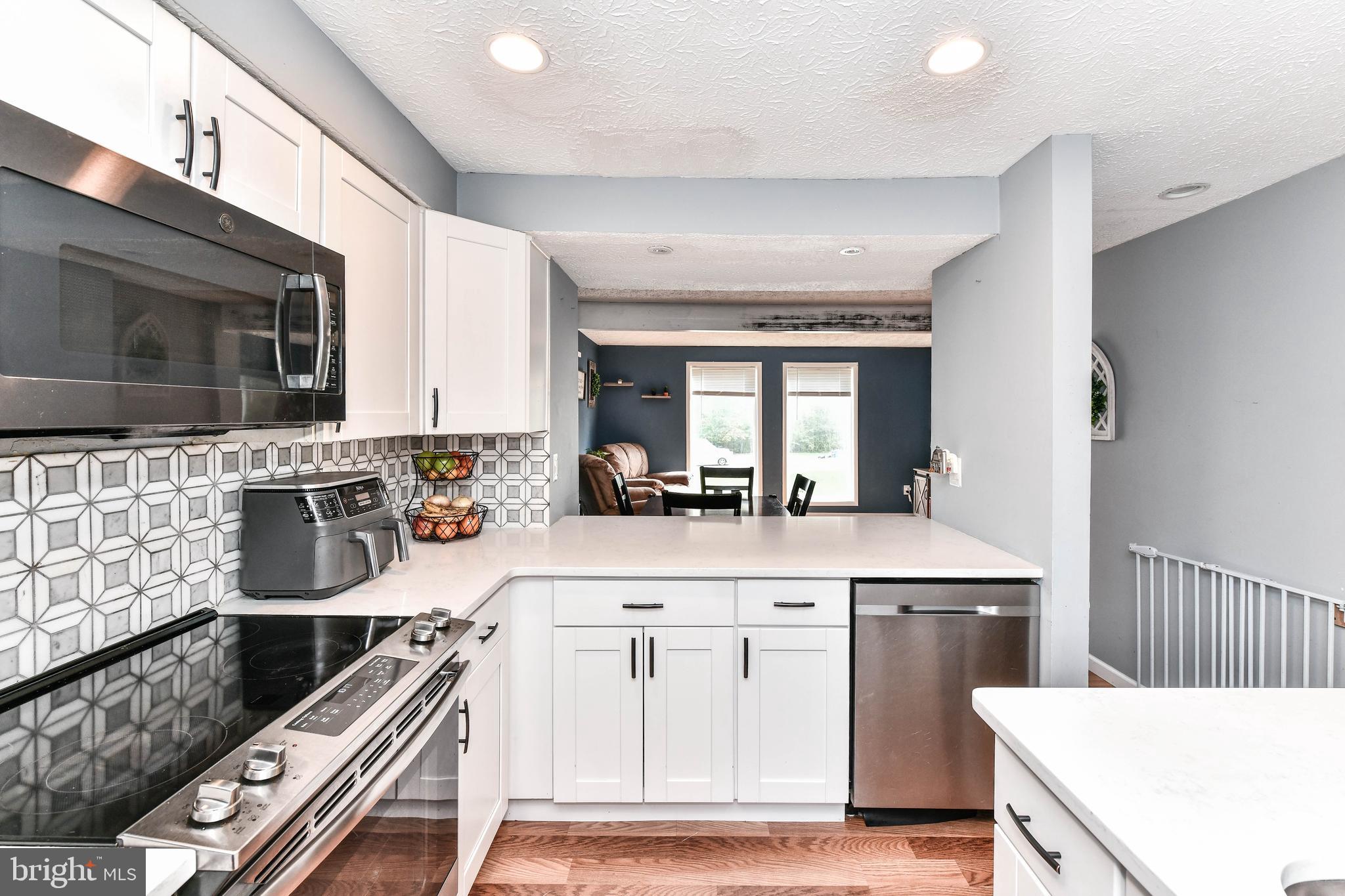 8240 Crestmont Circle Springfield, VA 22153 - Photo 6 of 24 Pass through to dining room