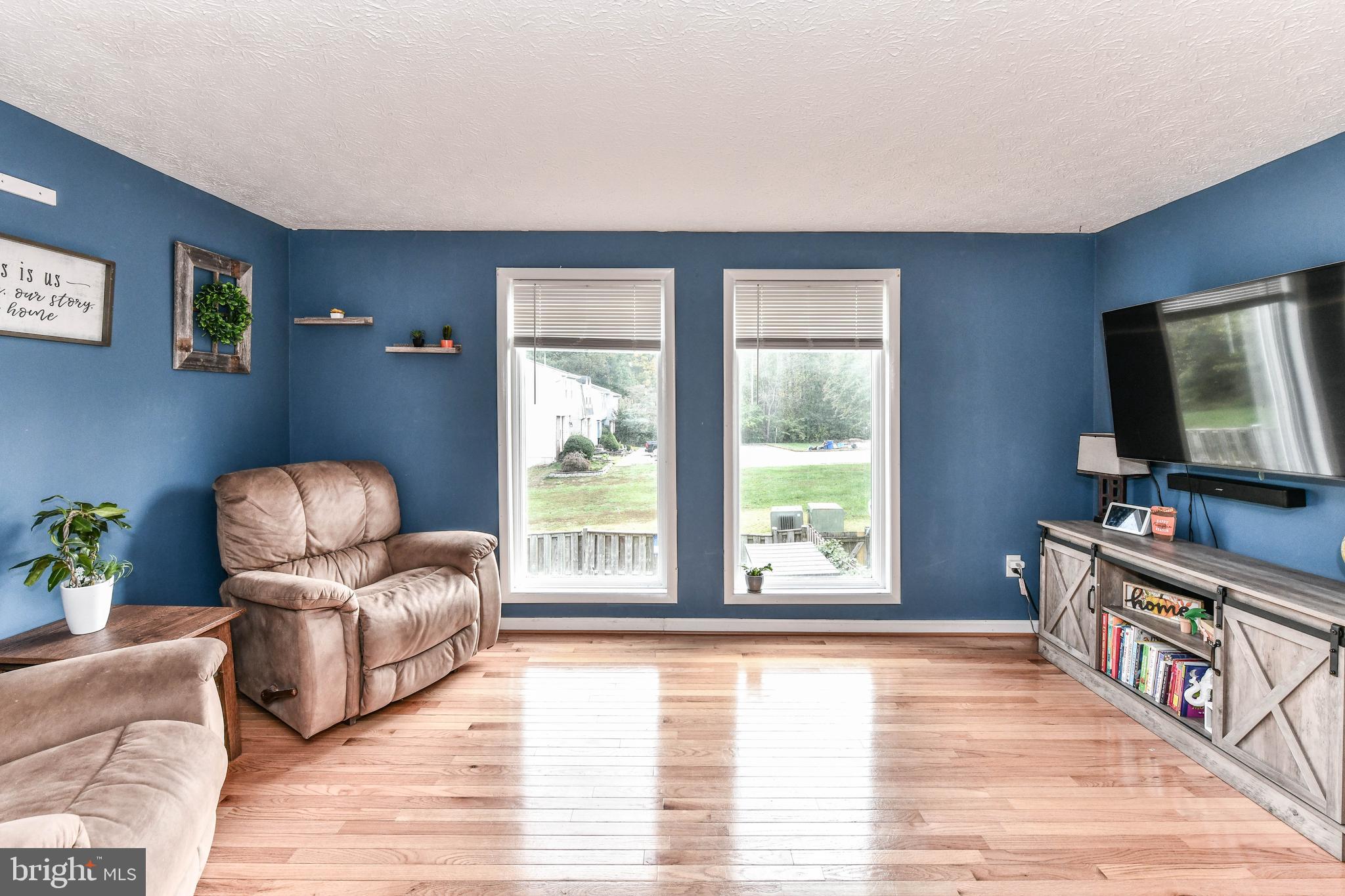 8240 Crestmont Circle Springfield, VA 22153 - Photo 8 of 24 Sunny Living Room, Overlooks common area