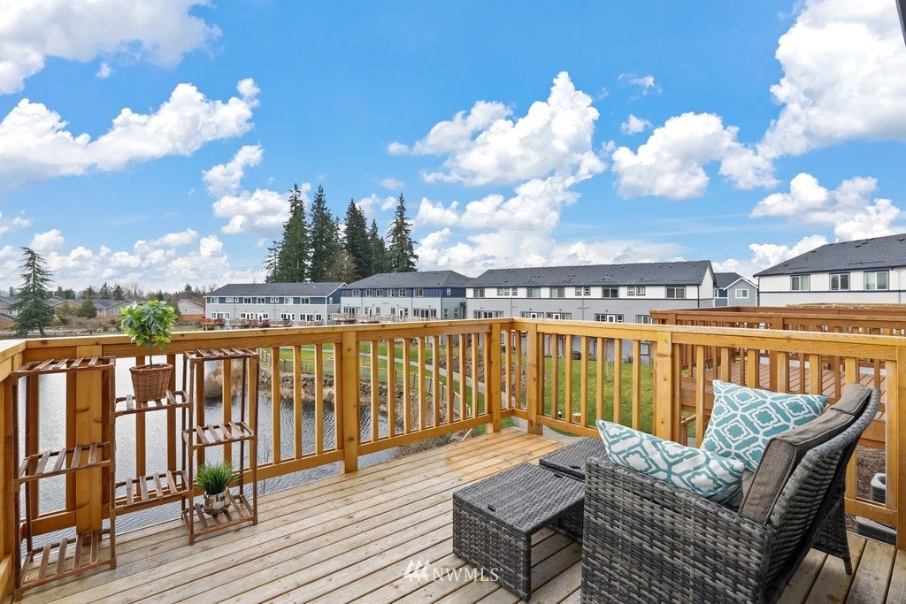 1621 Seattle Hill Road, Unit Z2 Bothell, WA 98012 - Photo 14 of 35 a view of a balcony with wooden floor