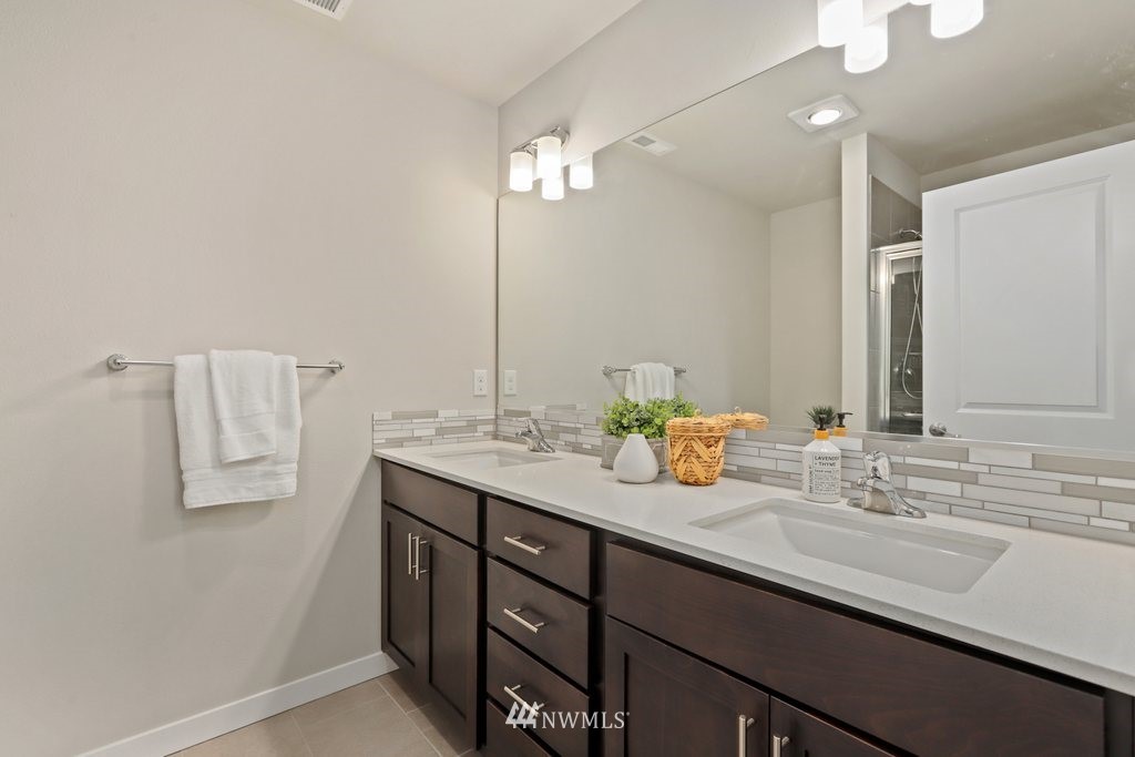 1621 Seattle Hill Road, Unit Z2 Bothell, WA 98012 - Photo 23 of 35 a bathroom with a sink double vanity and a mirror
