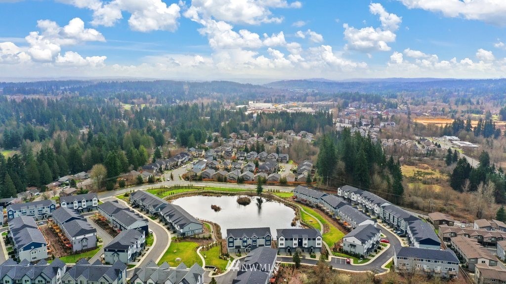 1621 Seattle Hill Road, Unit Z2 Bothell, WA 98012 - Photo 30 of 35 an aerial view of a swimming pool patio and mountain view