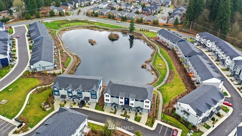 1621 Seattle Hill Road, Unit Z2 Bothell, WA 98012 - Photo 31 of 35 aerial view of a swimming pool a yard and outdoor seating