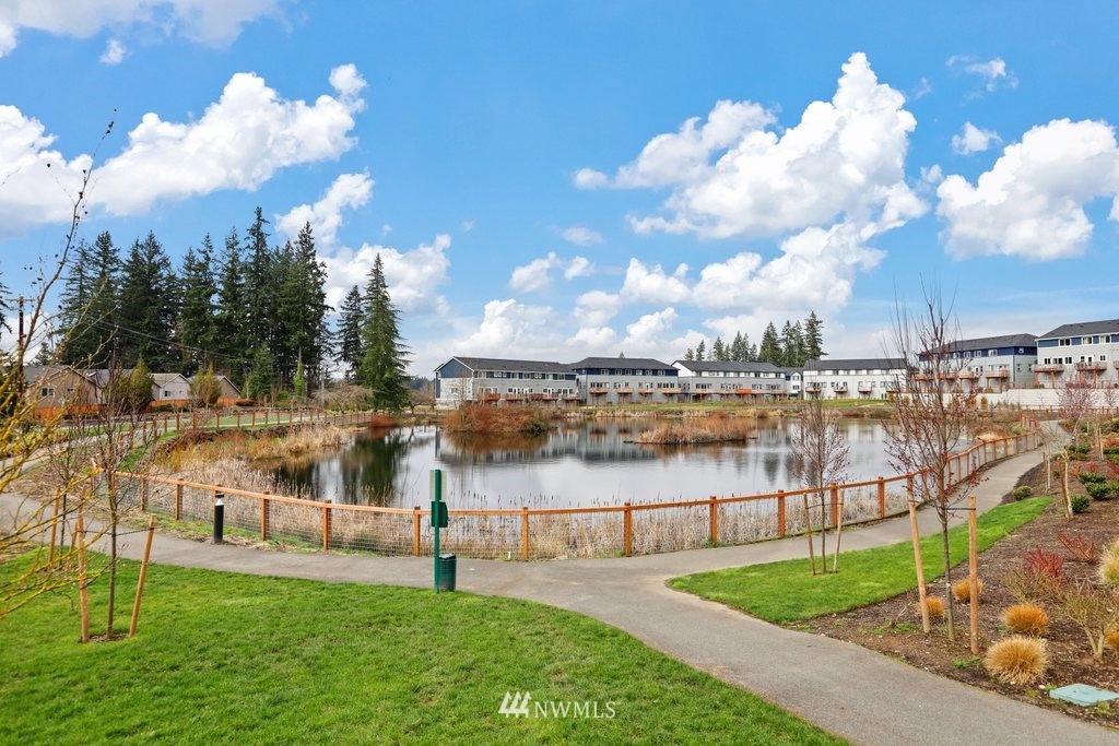 1621 Seattle Hill Road, Unit Z2 Bothell, WA 98012 - Photo 32 of 35 a view of a lake and a garden