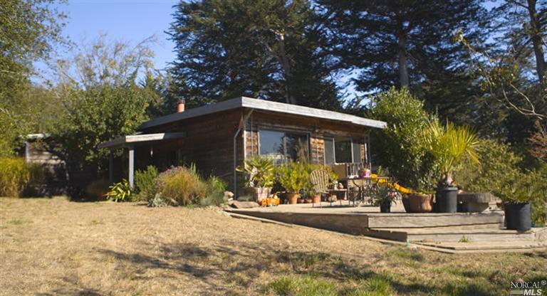 55 Viento Way Point Reyes Station, CA 94956 - Photo 1 of 1 front view of house with a yard