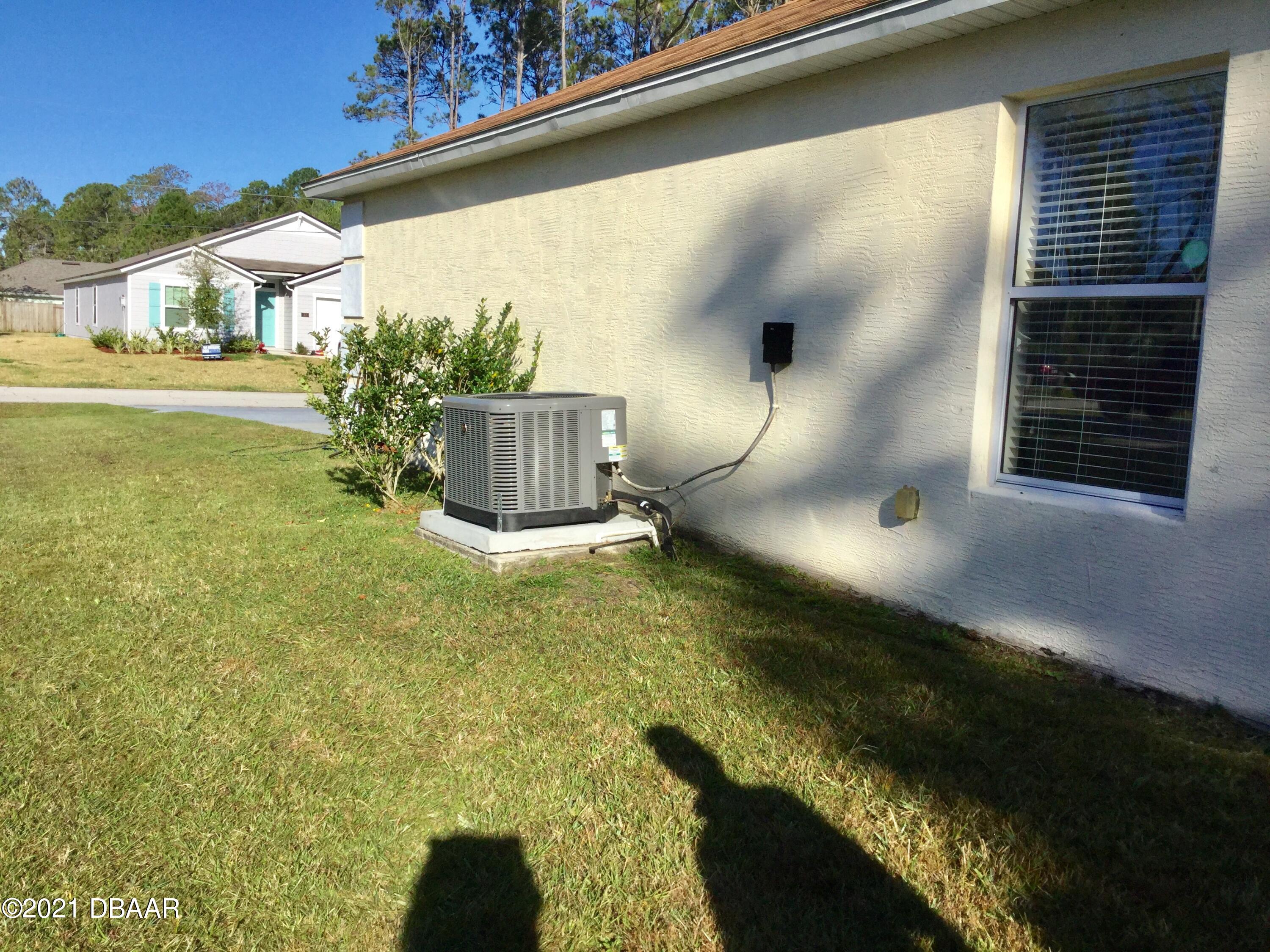 40 Riverside Lane Palm Coast, FL 32164 - Photo 13 of 47 a view of an outdoor space and a yard