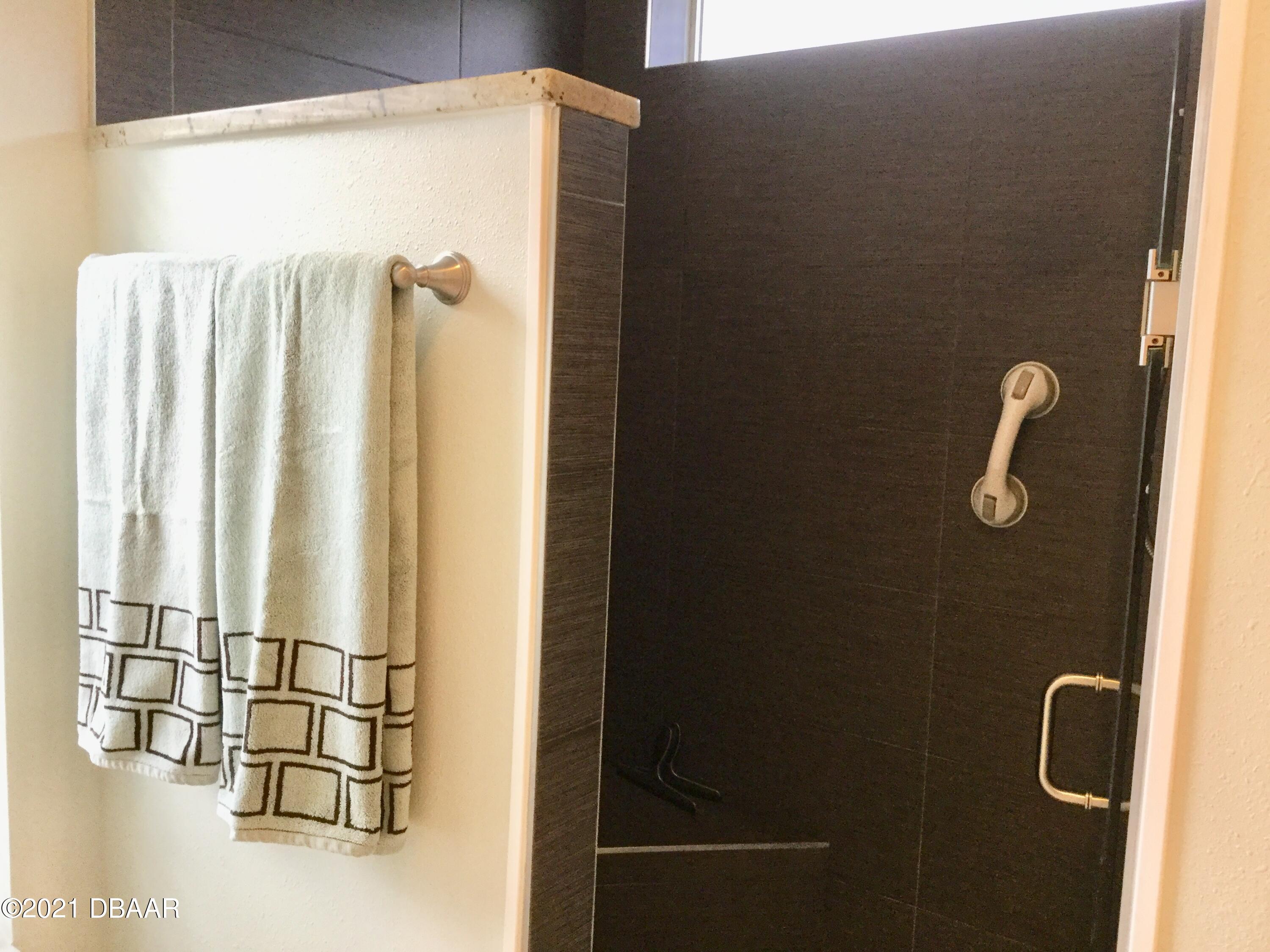 40 Riverside Lane Palm Coast, FL 32164 - Photo 39 of 47 a bathroom with a shower