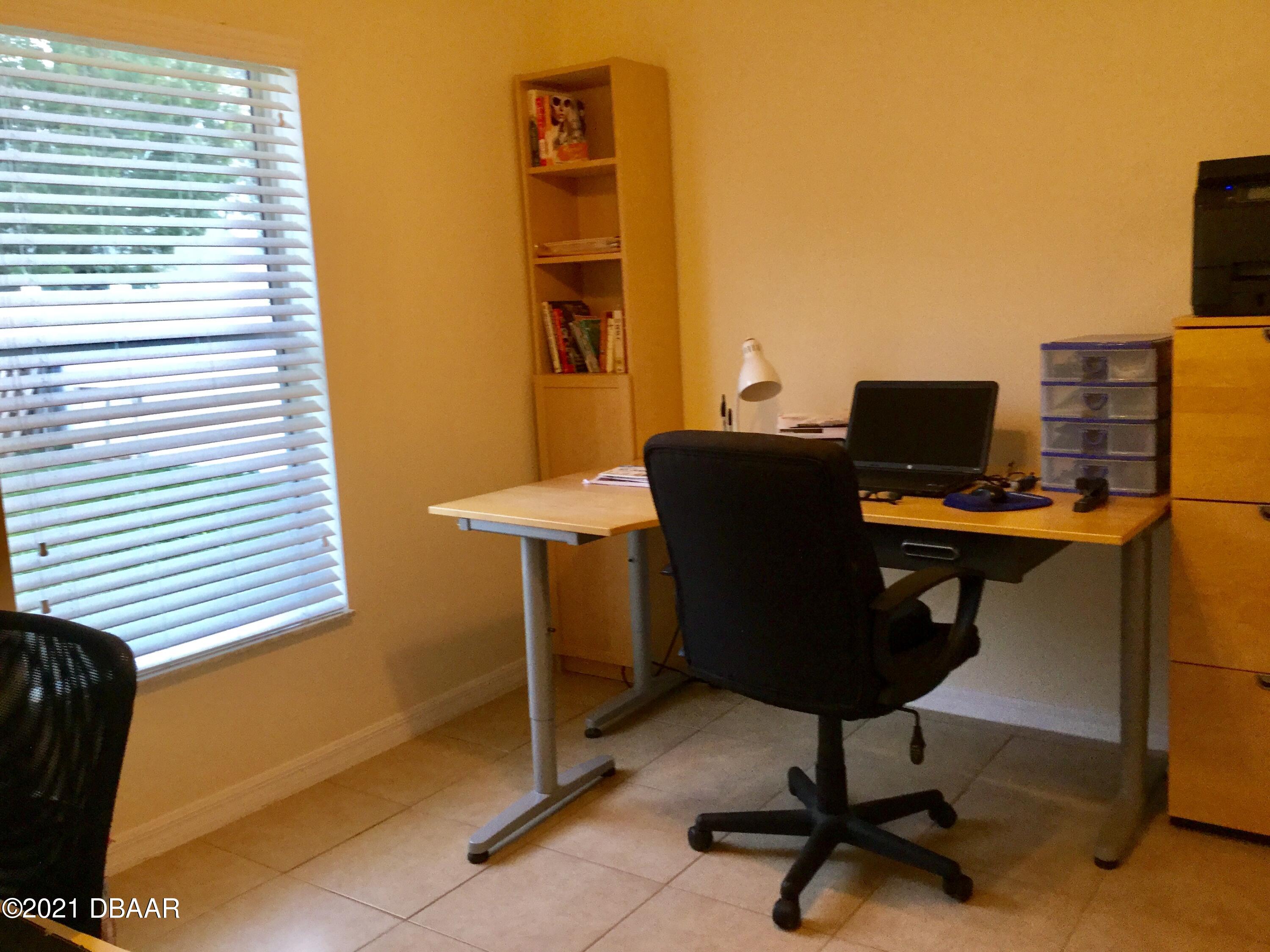 40 Riverside Lane Palm Coast, FL 32164 - Photo 44 of 47 a view of a workspace with furniture
